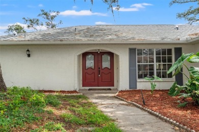 Welcome to this well maintained 2-bedroom, 2-bathroom on Oak Hills Country Club in Florida - for sale on GolfHomes.com, golf home, golf lot