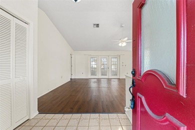 Welcome to this well maintained 2-bedroom, 2-bathroom on Oak Hills Country Club in Florida - for sale on GolfHomes.com, golf home, golf lot