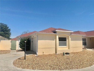 Welcome to your cozy and charming 2 bedroom, 2 bath home in the on Tierra Del Sol Golf and Country Club in Florida - for sale on GolfHomes.com, golf home, golf lot