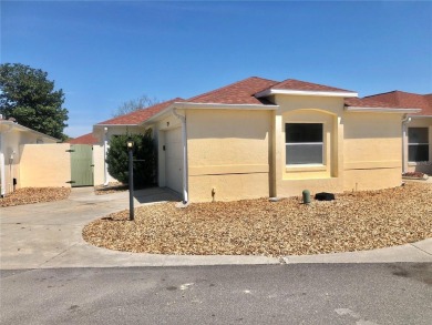 Welcome to your cozy and charming 2 bedroom, 2 bath home in the on Tierra Del Sol Golf and Country Club in Florida - for sale on GolfHomes.com, golf home, golf lot