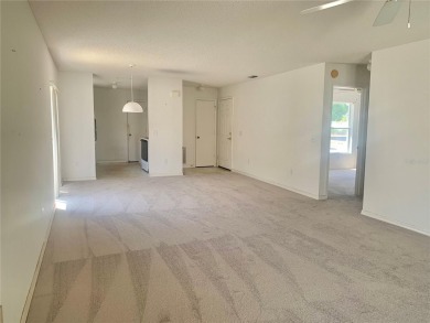 Welcome to your cozy and charming 2 bedroom, 2 bath home in the on Tierra Del Sol Golf and Country Club in Florida - for sale on GolfHomes.com, golf home, golf lot