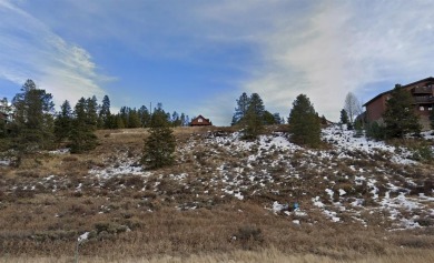 This stunning 0.67-acre vacant lot in Breckenridge offers the on Breckenridge Golf Club in Colorado - for sale on GolfHomes.com, golf home, golf lot