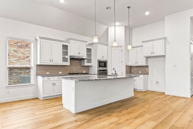 Welcome to 2407 Resort Dr, an exceptional home nestled in the on Heath Golf and Yacht Club in Texas - for sale on GolfHomes.com, golf home, golf lot