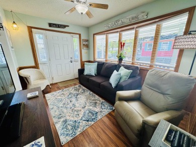 2 BED/2 BATH BEACH HOUSE IN OCEAN LAKES WITH WRAPAROUND COVERED on Prestwick Country Club in South Carolina - for sale on GolfHomes.com, golf home, golf lot