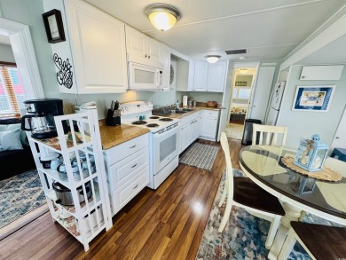 2 BED/2 BATH BEACH HOUSE IN OCEAN LAKES WITH WRAPAROUND COVERED on Prestwick Country Club in South Carolina - for sale on GolfHomes.com, golf home, golf lot