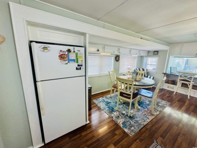 2 BED/2 BATH BEACH HOUSE IN OCEAN LAKES WITH WRAPAROUND COVERED on Prestwick Country Club in South Carolina - for sale on GolfHomes.com, golf home, golf lot