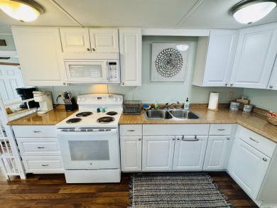 2 BED/2 BATH BEACH HOUSE IN OCEAN LAKES WITH WRAPAROUND COVERED on Prestwick Country Club in South Carolina - for sale on GolfHomes.com, golf home, golf lot