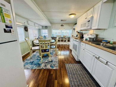 2 BED/2 BATH BEACH HOUSE IN OCEAN LAKES WITH WRAPAROUND COVERED on Prestwick Country Club in South Carolina - for sale on GolfHomes.com, golf home, golf lot