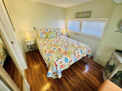 2 BED/2 BATH BEACH HOUSE IN OCEAN LAKES WITH WRAPAROUND COVERED on Prestwick Country Club in South Carolina - for sale on GolfHomes.com, golf home, golf lot
