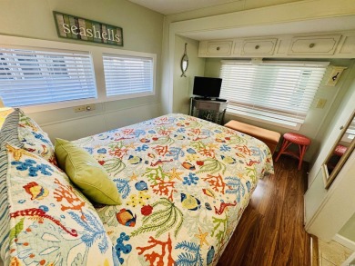 2 BED/2 BATH BEACH HOUSE IN OCEAN LAKES WITH WRAPAROUND COVERED on Prestwick Country Club in South Carolina - for sale on GolfHomes.com, golf home, golf lot