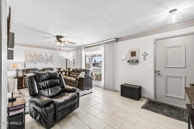 Welcome to this charming ''Sunlit Haven'' a 2BR/1 full bath/3/4 on PalmBrook Country Club in Arizona - for sale on GolfHomes.com, golf home, golf lot