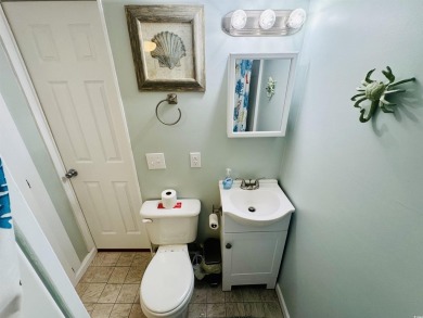 2 BED/2 BATH BEACH HOUSE IN OCEAN LAKES WITH WRAPAROUND COVERED on Prestwick Country Club in South Carolina - for sale on GolfHomes.com, golf home, golf lot