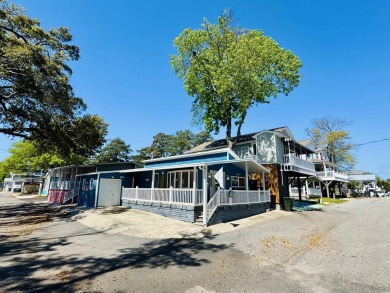 2 BED/2 BATH BEACH HOUSE IN OCEAN LAKES WITH WRAPAROUND COVERED on Prestwick Country Club in South Carolina - for sale on GolfHomes.com, golf home, golf lot