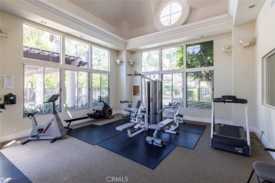 Experience luxury living in this 'Front Row' townhome in the on Big Canyon Country Club in California - for sale on GolfHomes.com, golf home, golf lot