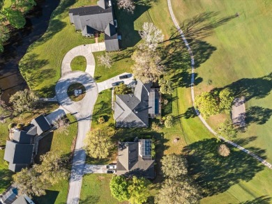 Step into luxury with this stunning ranch-style home in the on Cypresswood Golf and Country Club in Florida - for sale on GolfHomes.com, golf home, golf lot