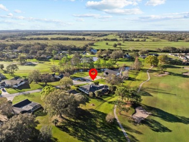 Under contract-accepting backup offers. New Price Reduction - on Cypresswood Golf and Country Club in Florida - for sale on GolfHomes.com, golf home, golf lot