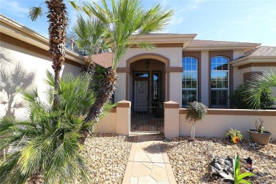 Sought after concrete block and stucco Sanibel located on the on Eagle Ridge At Spruce Creek Country Club in Florida - for sale on GolfHomes.com, golf home, golf lot