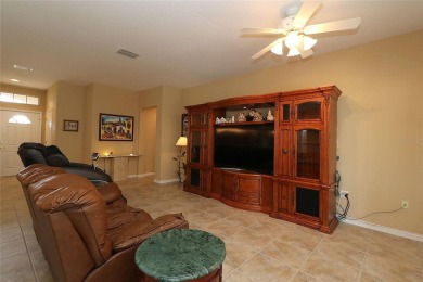 Sought after concrete block and stucco Sanibel located on the on Eagle Ridge At Spruce Creek Country Club in Florida - for sale on GolfHomes.com, golf home, golf lot