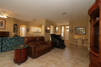 Sought after concrete block and stucco Sanibel located on the on Eagle Ridge At Spruce Creek Country Club in Florida - for sale on GolfHomes.com, golf home, golf lot