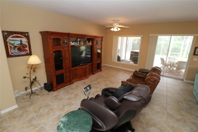 Sought after concrete block and stucco Sanibel located on the on Eagle Ridge At Spruce Creek Country Club in Florida - for sale on GolfHomes.com, golf home, golf lot
