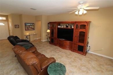 Sought after concrete block and stucco Sanibel located on the on Eagle Ridge At Spruce Creek Country Club in Florida - for sale on GolfHomes.com, golf home, golf lot