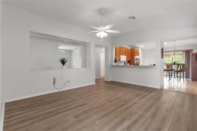 Brand new laminate flooring.  Afforded protection with a new on Kingsway Country Club in Florida - for sale on GolfHomes.com, golf home, golf lot