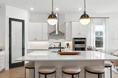 A DESIGNER SHOWCASE on the 13th Hole!  This stunning 5-bedroom on Bella Collina Golf Club in Florida - for sale on GolfHomes.com, golf home, golf lot