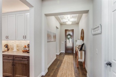 This beautifully designed home, loaded with premium upgrades on Wildhorse Golf Club of Robson Ranch in Texas - for sale on GolfHomes.com, golf home, golf lot