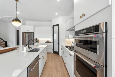 A DESIGNER SHOWCASE on the 13th Hole!  This stunning 5-bedroom on Bella Collina Golf Club in Florida - for sale on GolfHomes.com, golf home, golf lot