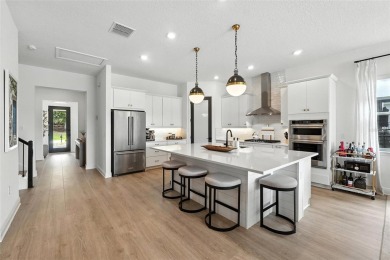 A DESIGNER SHOWCASE on the 13th Hole!  This stunning 5-bedroom on Bella Collina Golf Club in Florida - for sale on GolfHomes.com, golf home, golf lot