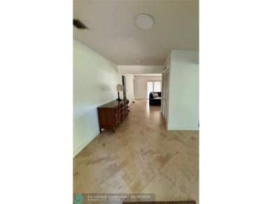 Stunning 4-Bedroom, 4-Bathroom Home on Coral Springs Country on Country Club of Coral Springs in Florida - for sale on GolfHomes.com, golf home, golf lot
