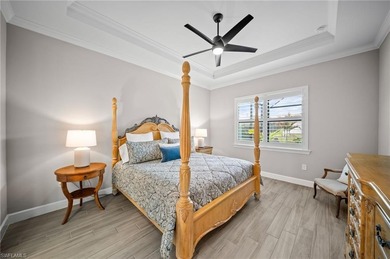 Built in 2022, this light-filled *Summerwood* floorplan home on Calusa Pines Golf Club in Florida - for sale on GolfHomes.com, golf home, golf lot