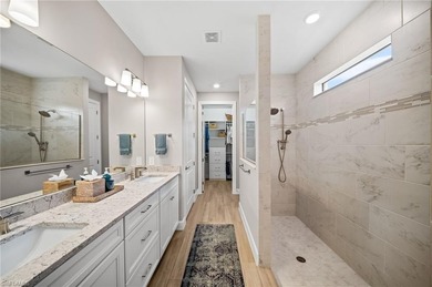 Built in 2022, this light-filled *Summerwood* floorplan home on Calusa Pines Golf Club in Florida - for sale on GolfHomes.com, golf home, golf lot