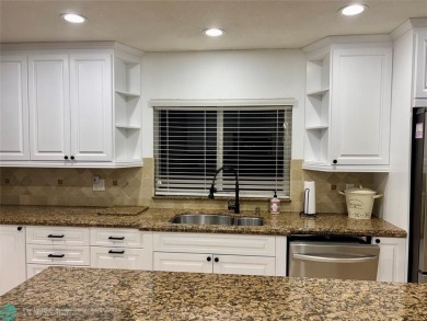 Stunning 4-Bedroom, 4-Bathroom Home on Coral Springs Country on Country Club of Coral Springs in Florida - for sale on GolfHomes.com, golf home, golf lot
