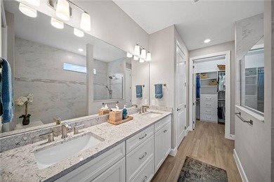 Built in 2022, this light-filled *Summerwood* floorplan home on Calusa Pines Golf Club in Florida - for sale on GolfHomes.com, golf home, golf lot