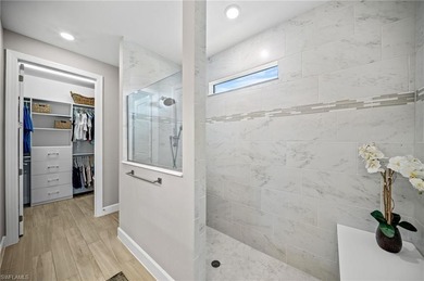 Built in 2022, this light-filled *Summerwood* floorplan home on Calusa Pines Golf Club in Florida - for sale on GolfHomes.com, golf home, golf lot