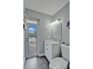 Stunning 4-Bedroom, 4-Bathroom Home on Coral Springs Country on Country Club of Coral Springs in Florida - for sale on GolfHomes.com, golf home, golf lot