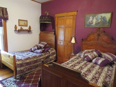 This charming Victorian home with wraparound covered porch on Pocahontas Golf Course in Iowa - for sale on GolfHomes.com, golf home, golf lot