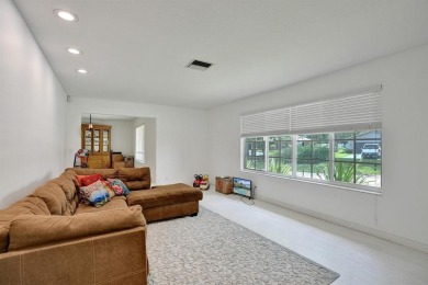 Stunning 4-Bedroom, 4-Bathroom Home on Coral Springs Country on Country Club of Coral Springs in Florida - for sale on GolfHomes.com, golf home, golf lot