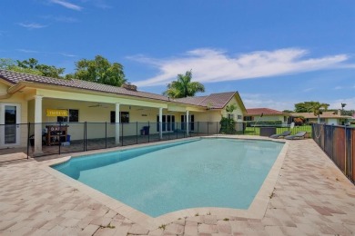 Stunning 4-Bedroom, 4-Bathroom Home on Coral Springs Country on Country Club of Coral Springs in Florida - for sale on GolfHomes.com, golf home, golf lot