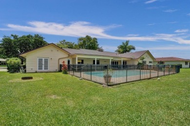 Stunning 4-Bedroom, 4-Bathroom Home on Coral Springs Country on Country Club of Coral Springs in Florida - for sale on GolfHomes.com, golf home, golf lot