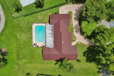 Stunning 4-Bedroom, 4-Bathroom Home on Coral Springs Country on Country Club of Coral Springs in Florida - for sale on GolfHomes.com, golf home, golf lot