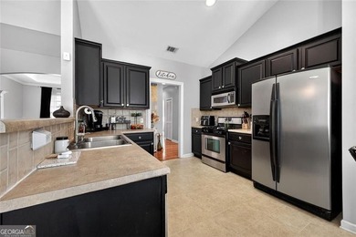 If finding a home that feels like *vacation everyday* is at the on Canongate At Heron Bay in Georgia - for sale on GolfHomes.com, golf home, golf lot