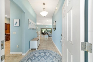 BOND PAID and NEW ROOF on this LOVELY BEGONIA designer home with on The Links of Spruce Creek in Florida - for sale on GolfHomes.com, golf home, golf lot
