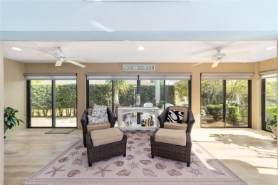 BOND PAID and NEW ROOF on this LOVELY BEGONIA designer home with on The Links of Spruce Creek in Florida - for sale on GolfHomes.com, golf home, golf lot