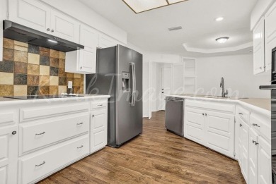 Step into this beautifully updated 4-bedroom, 3-bath home on Texas Rangers Golf Club  in Texas - for sale on GolfHomes.com, golf home, golf lot
