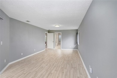 Price Adjustment. This attractive home features a soaring on Sandpiper Golf Club in Florida - for sale on GolfHomes.com, golf home, golf lot