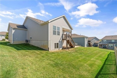 Welcome home to this stunning Reverse 1.5 Story in the coveted on Prairie Highlands Golf Course in Kansas - for sale on GolfHomes.com, golf home, golf lot