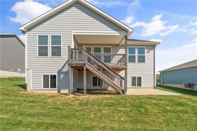 Welcome home to this stunning Reverse 1.5 Story in the coveted on Prairie Highlands Golf Course in Kansas - for sale on GolfHomes.com, golf home, golf lot