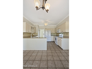 A lot of house for the money in a well-established neighborhood on The Plantation Golf Club in Mississippi - for sale on GolfHomes.com, golf home, golf lot